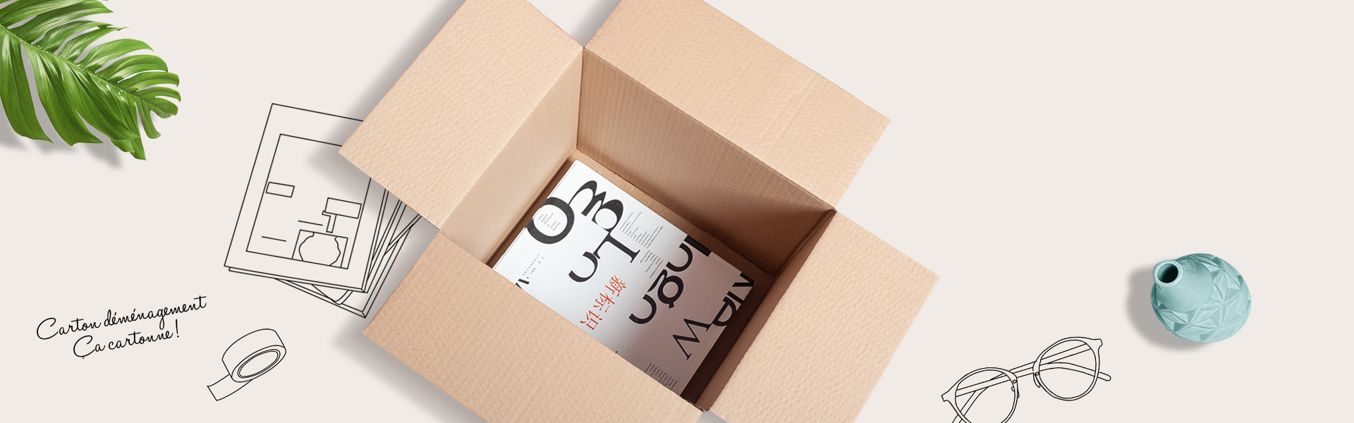 Carton de déménagement ouvert, prêt à être rempli